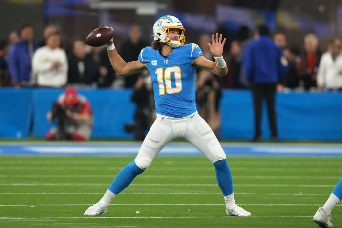 Dec 16, 2021; Inglewood, California, USA; Los Angeles Chargers quarterback Justin Herbert (10) throws a pass against the Kansas City Chiefs in the first half at SoFi Stadium. Mandatory Credit: Kirby Lee-USA TODAY Sports